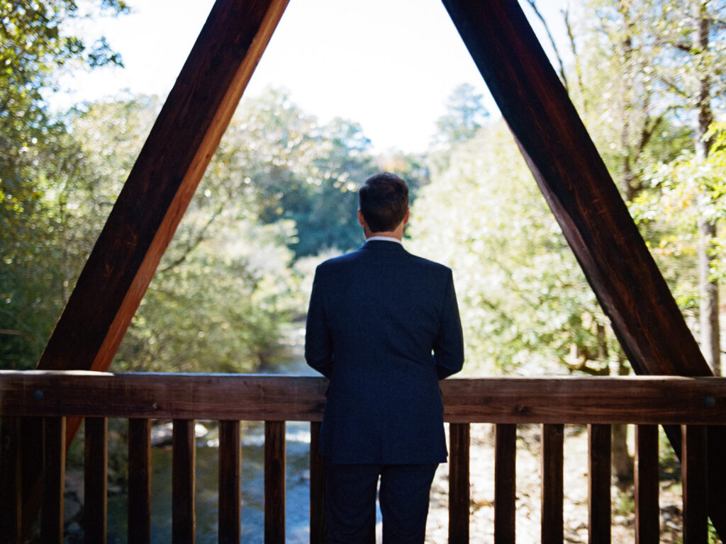 Groom waiting prior to fist look.